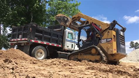 Used skid steer dump truck 